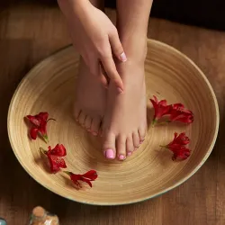 Professional pedicure service with pink polish at Salon De Cheveux in Fremont County